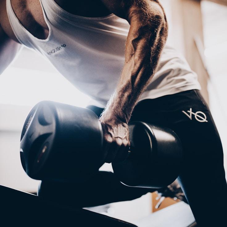 Professional gym interior with strength equipment